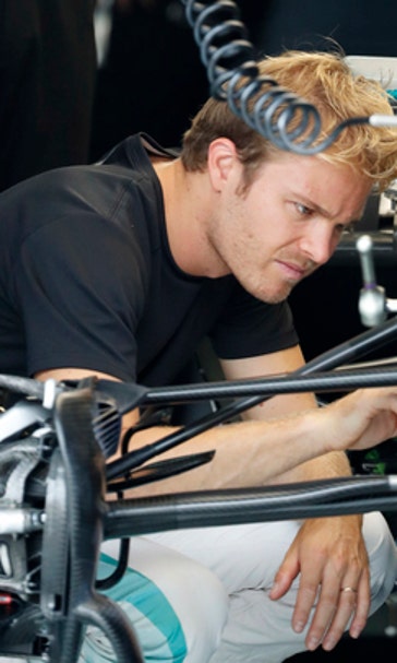 Advantage Rosberg as F1 title fight resumes at stormy Sepang